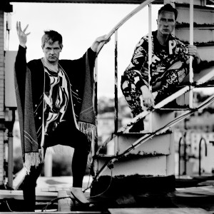 Gus Gus members Daniel Agust Haraldsson and Birgir Porarinsson posing on the stairs.