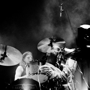 Double exposure of Marian Gold and the drummer on the stage at the concert of Alphaville.
